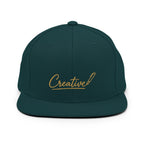 Embroidered snapback cap in gold script — Merlin Fashion