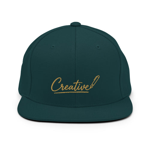 Embroidered snapback cap in gold script — Merlin Fashion