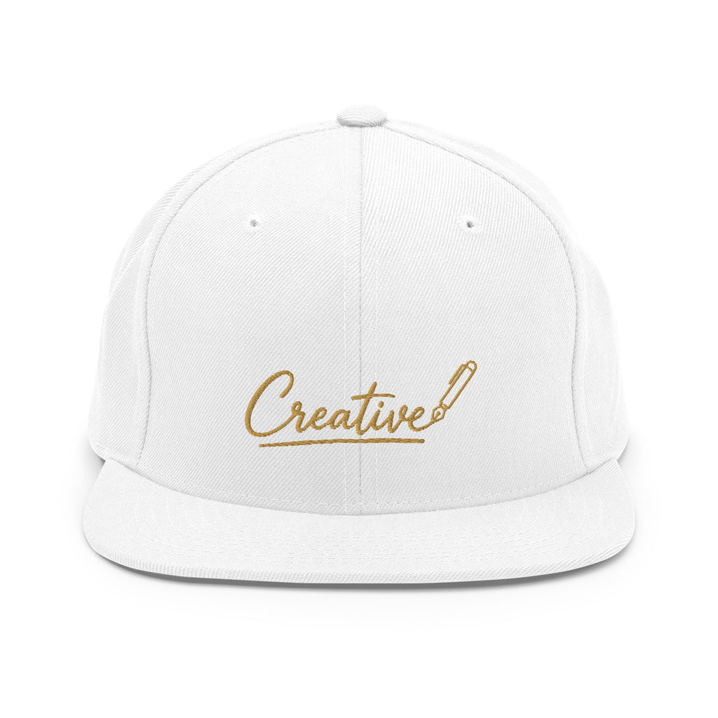Embroidered snapback cap in gold script — Merlin Fashion
