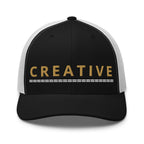 Embroidered trucker hat with gold lettering — Merlin Fashion
