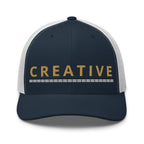 Embroidered trucker hat with gold lettering — Merlin Fashion
